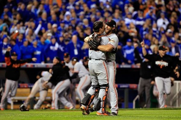 The San Francisco Giants, behind Madison Bumgarner, hoist the trophy yet again. (Photo by Jamie Squire/Getty Images)