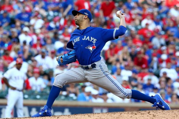 After helping the Blue Jays to the postseason, David Price might be wearing blue yet again in 2016--this time, as a Chicago Cub. (Photo by Ronald Martinez/Getty Images)